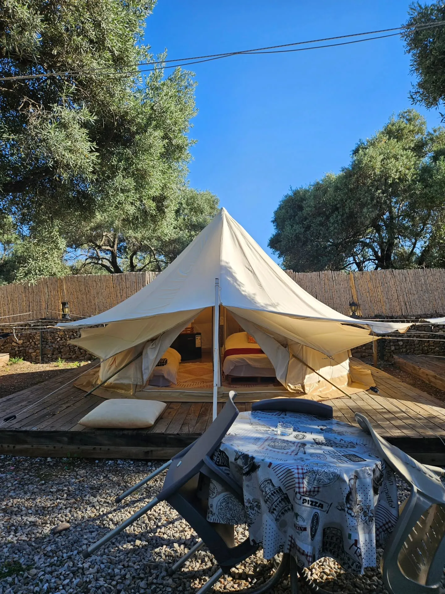 Tent interior with twin and double beds